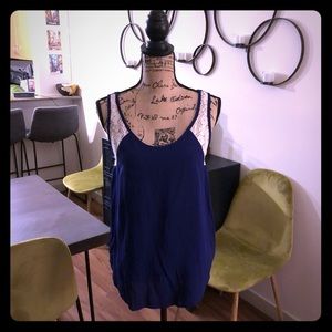 Blue tank top with white crochet shoulders